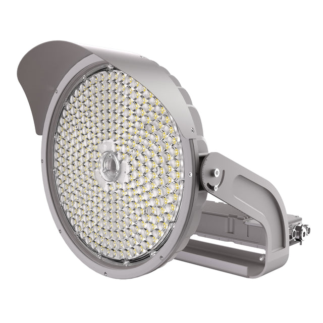 Round industrial light fixture with visible LED elements on a white background